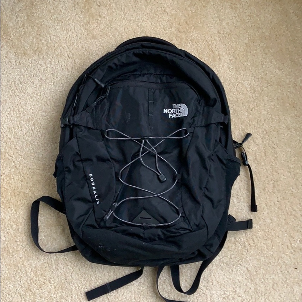 A black North Face backpack.